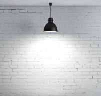 Фотообои Лампа над серой кирпичной стеной